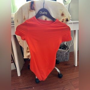 auden orange bodysuit